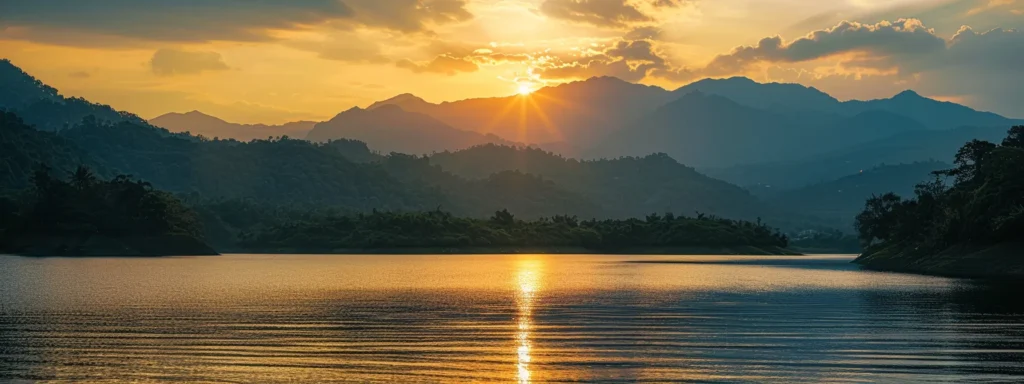 Successful Interior Remodeling Starts with Busy Builders 6 a breathtaking sunset casts a warm, golden glow over a tranquil lake, surrounded by lush greenery and silhouetted mountains, capturing a serene moment of natural beauty.