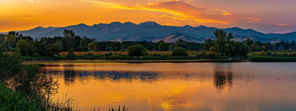 Why a basement remodel is the best thing you can do 6 a vibrant sunset casts a golden hue over a tranquil lake, with silhouetted mountains rising majestically in the background, reflecting the warm colors on the water's surface.