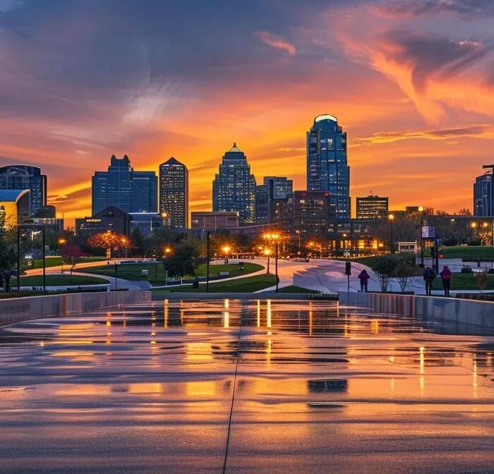 a modern urban skyline of des moines showcases innovative home building trends with sleek architectural designs highlighted by vibrant city lights at dusk.
