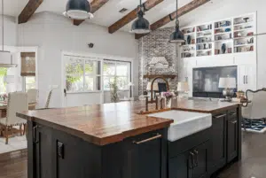 Remodeled kitchen with island, cabinets and pendant lighting in an Iowa home