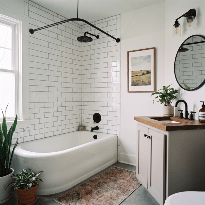 Bathroom remodel with walk-in tiled shower and vanity in a Nevada Iowa home
